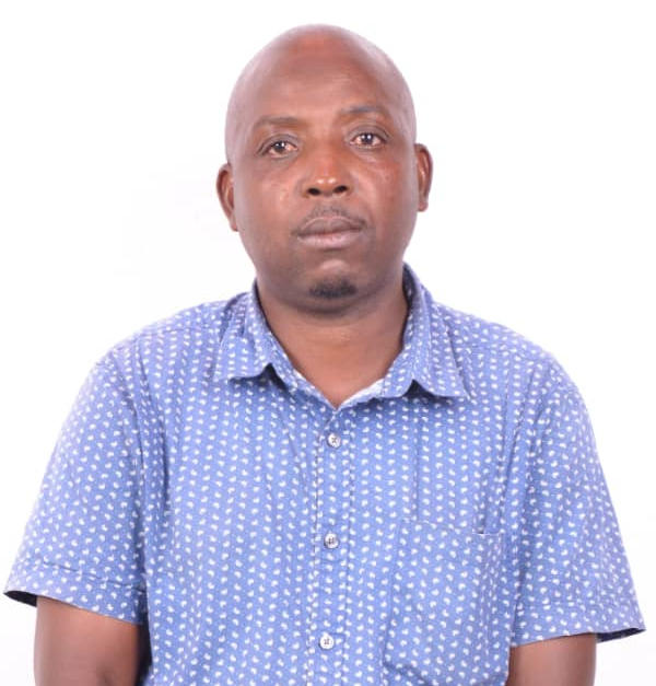 MONDAY JUSTUS - Deputy Executive Director